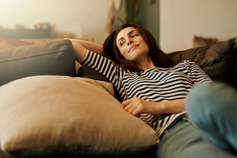 Woman Relaxing on Couch